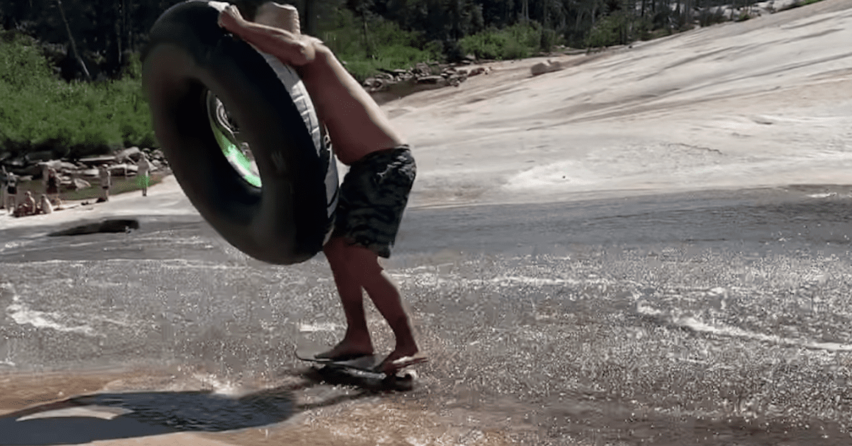 Skater Bombs Natural Waterslide In Yosemite With Inner Tube In Hand