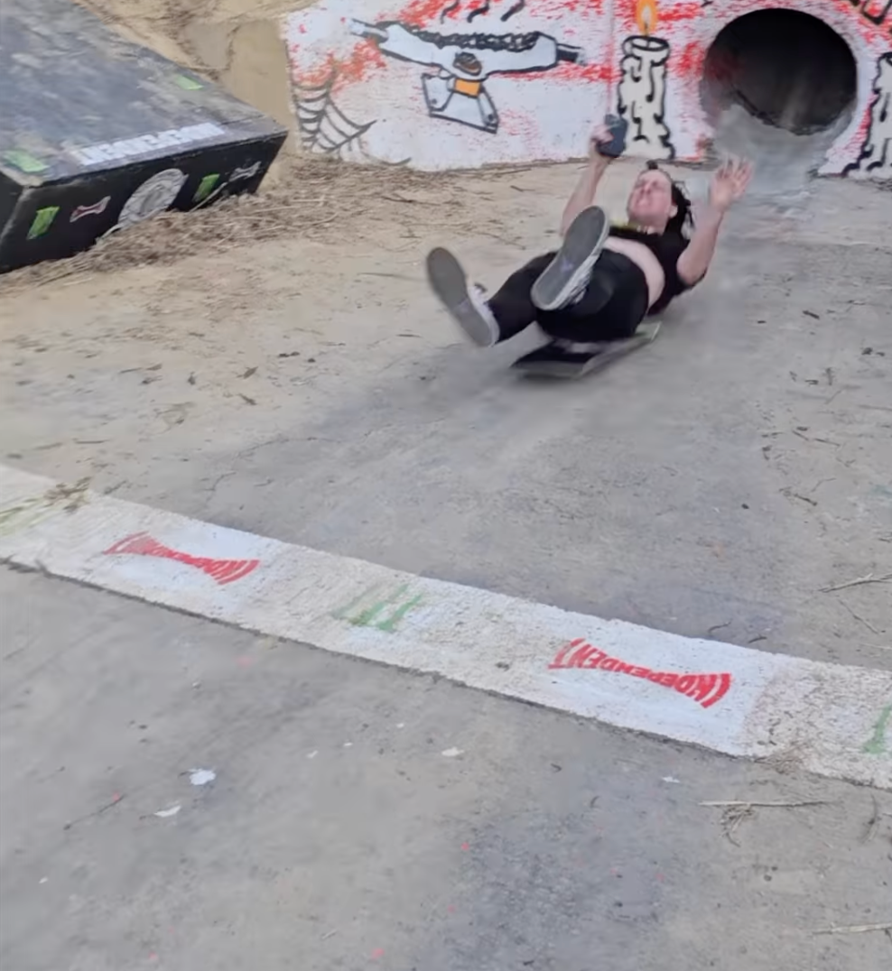 Shooting down this sewer drain on a skateboard deck is nightmare material